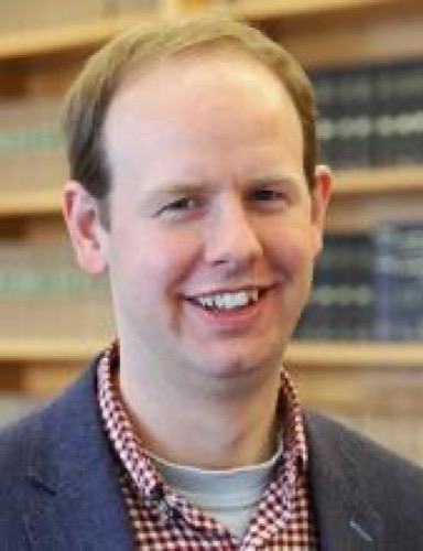 Dr. Alister Mills